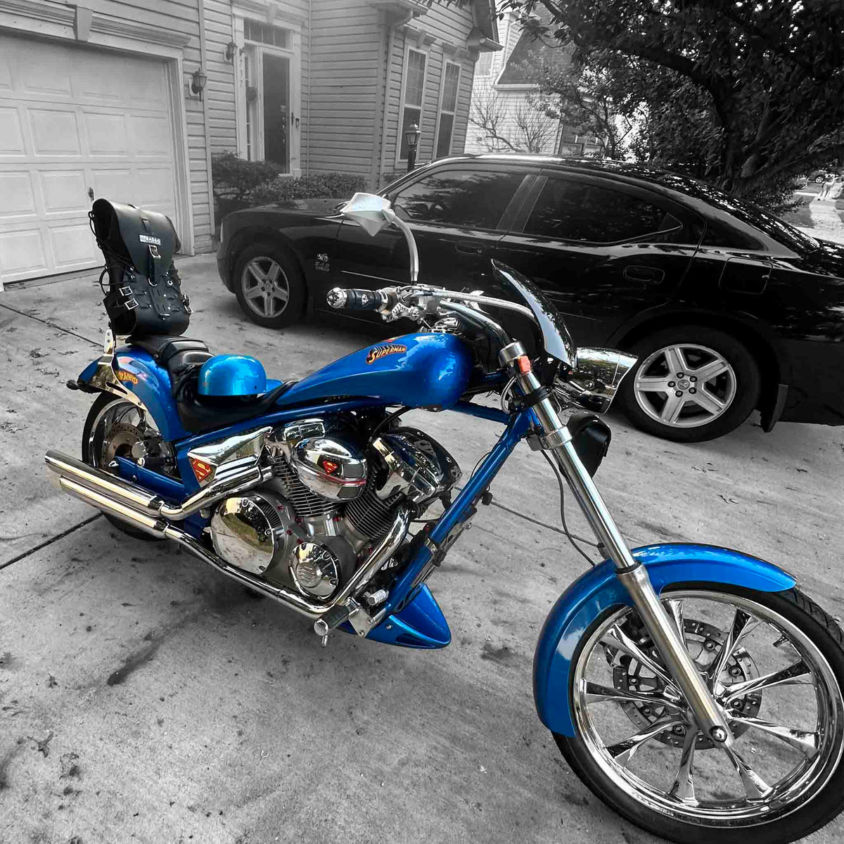 Right side riding stance—dual roll-top dry bag secured on Honda Fury
