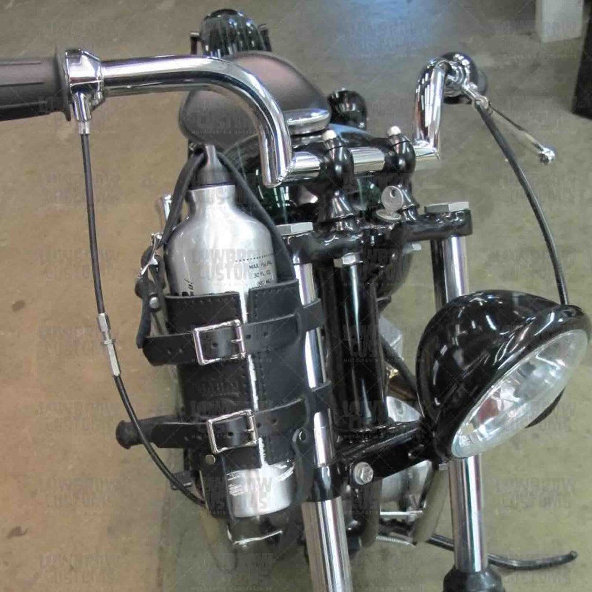 Add a piece of mind to your ride with the FB01 spare fuel gas bottle carrier. Hand crafted in USA with premium leather and top quality hardware. Durable and stylish, it's the perfect fit for your motorcycle.