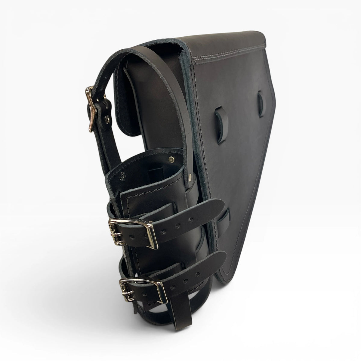 A black leather motorcycle leg shield with adjustable straps and silver-tone buckles, shown from a three-quarters angle on a light gray background.