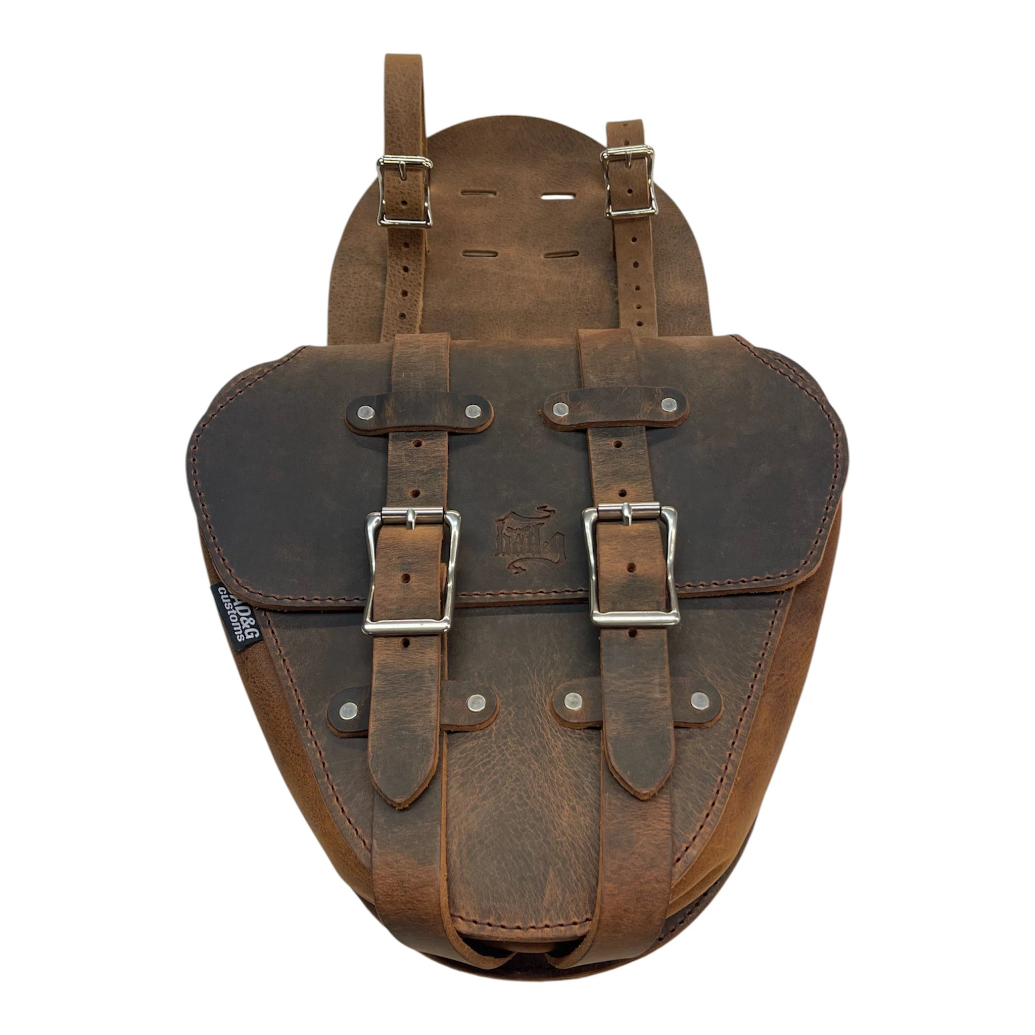 Brown leather backpack with metal buckles on a white background